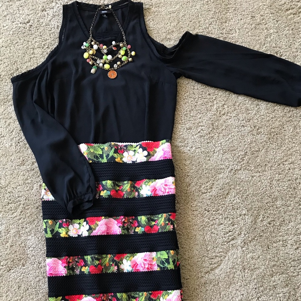 Shoulders exposing long sleeve blouse